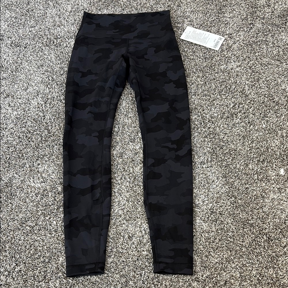 Wonder train HR. tight 28” black camo leggings new with tags. Size 6